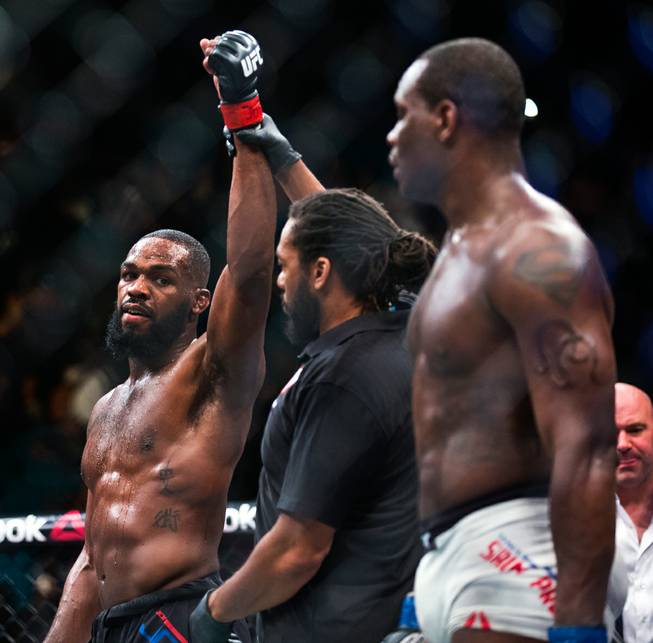 Light Heavyweight Jon Jones looks to Ovince St. Preux as he is awarded the win following their UFC 197 match at the MGM Grand Garden Arena on Friday, April 23, 2016.