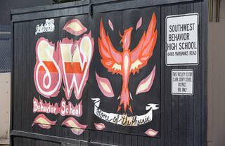 A painting of a phoenix, the Southwest Behavior High School mascot, is shown on the side of portable classroom, 6480 Fairbanks Rd., Wednesday, April 27, 2016.