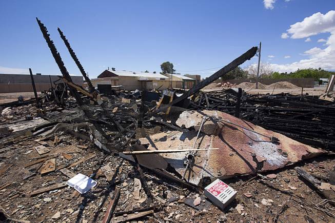 The remains of a building at the old Las vegas Zoo are shown Sunday May 1, 2016. The building was destroyed by fire on Saturday night, officials said.