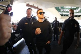 Boxers make their arrivals at the MGM Grand lobby in Las Vegas Tuesday, May 3, 2016. Canelo Alvarez of Mexico and Amir Khan of England will headline the card at the T-Mobile Arena on Saturday
