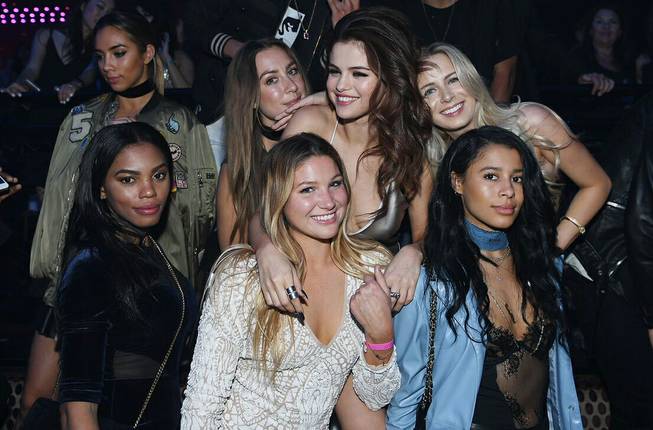 Selena Gomez, second from right at top, hosts at Light ...