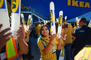 Ikea workers bang noise sticks together during the grand opening of Nevada's first Ikea home furnishings store Wednesday, May 18, 2016.