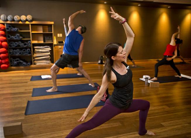 Cancer survivor Susan Hilburger teaches yoga at various studios, gyms and corporations around the Las Vegas area.