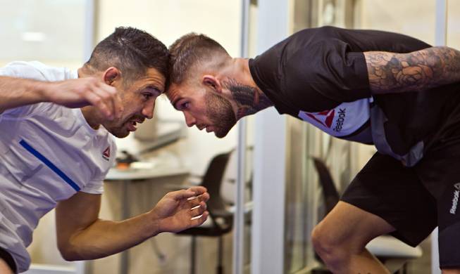 Bantamweight Cody Garbrandt gets face to face with his trainer during the UFC Fight Night workouts at the Las Vegas Harley Davidson store on Thursday, May 27, 2016.