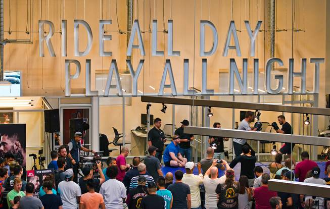 A crowd gathers for the UFC Fight Night workouts at the Las Vegas Harley Davidson store on Thursday, May 27, 2016.