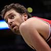 Chicago Bulls center Pau Gasol looks up Sunday, April 3, 2016, as the Milwaukee Bucks take a free throw during the second half of an NBA basketball game in Milwaukee. Gasol says he is considering not playing at the Olympics because of the Zika virus. The Spanish basketball player says there is too much uncertainty about the situation in Brazil and anyone going to Rio de Janeiro for the games should "think about" whether it's worth the risk. 