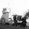 Entertainer Line Renaud and Caesars Palace developer Jay Sarno ride a flower chariot and horse sent from the Sahara on opening day Aug. 6, 1966, in Las Vegas.