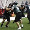 Brett Boyko, right, runs a drill with Isaac Seumalo during the Philadelphia Eagles' rookie minicamp at the team's NFL football training facility, Friday, May 13, 2016, in Philadelphia.