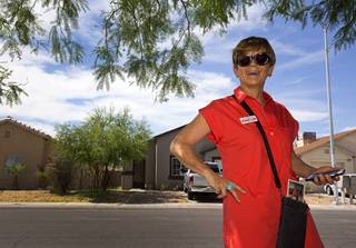 Democratic Congressional candidate Susie Lee canvasses a neighborhood near Lake Mead and Martin Luther King boulevards Thursday, June 9, 2016.