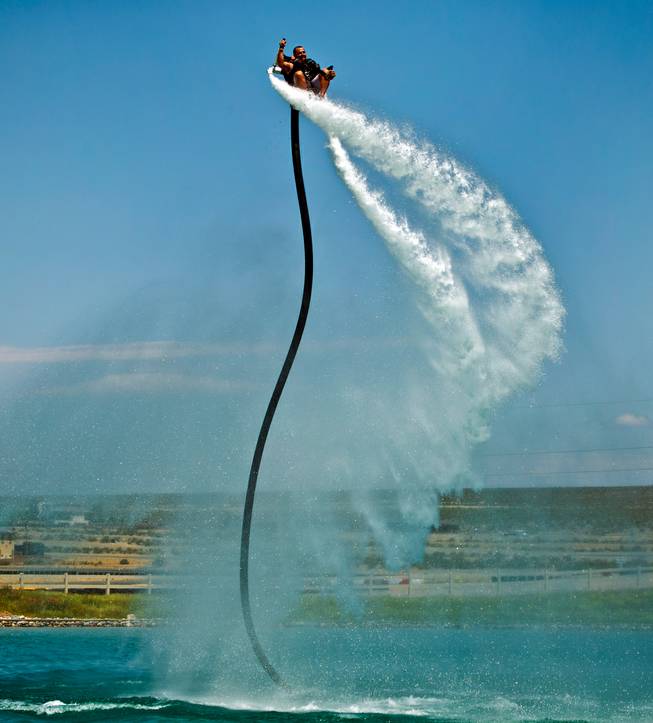 Jetpack competitor Scott Geltman extends to full height  above the water during Hydro-Fest 2016 about Lake Spring Mountain in Pahrump on Saturday, June 11, 2016.