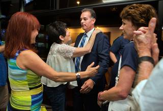 Danny Tarkanian arrives to hugs and praise for his primary election watch party at Born and Raised in Las Vegas on Tuesday, June 14, 2016.