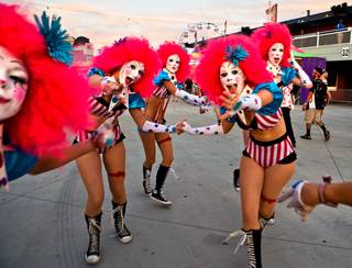 Colorful characters greet attendees during the first night of the Electric Daisy Carnival on Friday, June 17, 2016, at Las Vegas Motor Speedway.