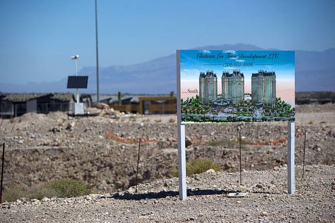A sign shows an artist's illustration of Spanish View Towers at the former development site on West Maule Avenue, near Durango Drive and I-215, is shown Thursday, June 16, 2016.