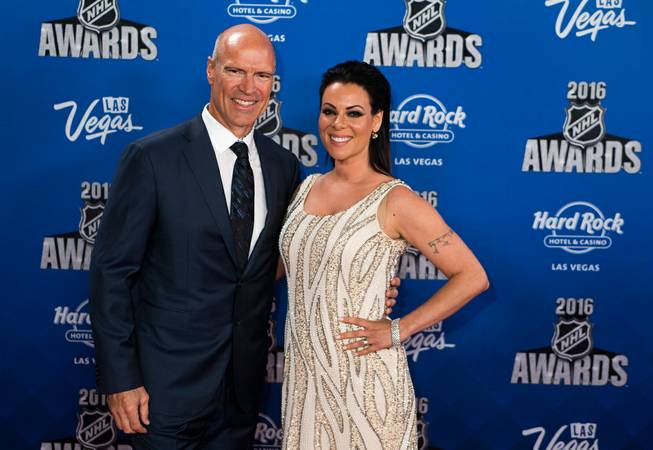 Mark Messier and Tara Slone pose for photographers on the Red Carpet leading up to the 2016 NHL Awards at The Joint inside the Hard Rock Hotel and Casino on Wednesday, June 22, 2016.