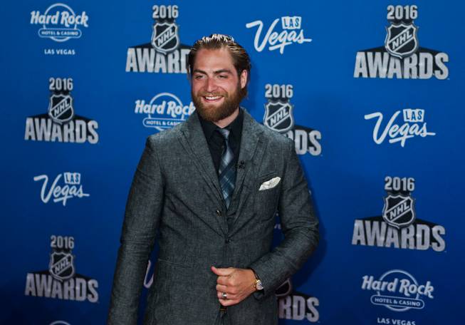 Braden Holtby poses for photographers on the Red Carpet leading up to the 2016 NHL Awards at The Joint inside the Hard Rock Hotel and Casino on Wednesday, June 22, 2016.