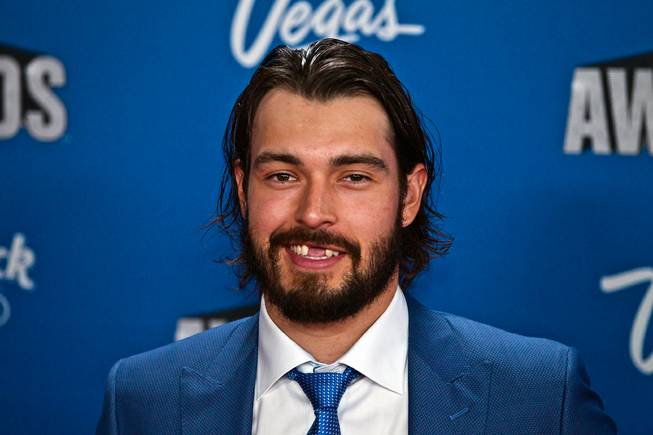 Drew Doughty shows off a missing teeth hockey smile as he poses for photographers on the Red Carpet leading up to the 2016 NHL Awards from The Joint within the Hard Rock Hotel and Casino on Wednesday, June 22, 2016.
