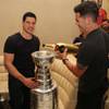 Sidney Crosby of the Stanley Cup champion Pittsburgh Penguins and former Penguin Pascal Dupuis enjoy Moet Imperial Gold in the Stanley Cup on Tuesday, June 21, 2016, at Fizz in Caesars Palace.
