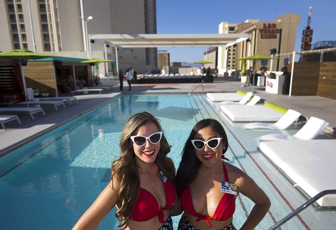 Beverage servers Shawna Hanley, left, and Isabelle Flores pose during a preview event for the new rooftop pool at the Plaza in downtown Las Vegas Thursday, June 23, 2016. The pool officially opens on July 2.