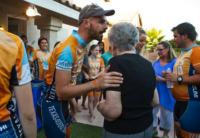 Cancer survivor Michael Tatalovich, 20, talks with his grandmother Helen while on a rest step at his parent's home in Henderson on Thursday, June 23, 2016.  He is joined by other Texas 4000 of University of Texas at Austin  riders doing a 4,000-mile, 70-day cycling tour through North America.