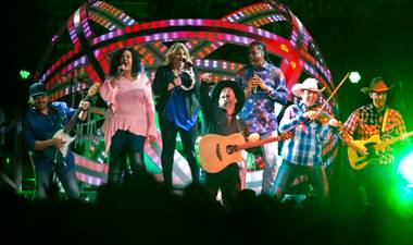 Garth Brooks takes the stage to perform with his band at the T-Mobile Arena on Friday, June 24, 2016.