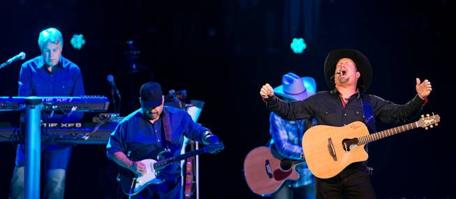 Garth Brooks takes the stage to perform with his band at the T-Mobile Arena on Friday, June 24, 2016.