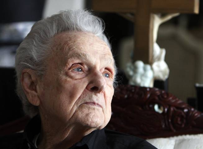 This photo taken Jan. 16, 2012, shows Ralph Stanley looking out a window while sitting in the living room of the Stanley home outside of Coeburn, Va. Stanley died Thursday, June 23, 2016. He was 89.