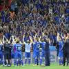 Iceland players celebrate with their supporters at the end of the Euro 2016 round of 16 soccer match between England and Iceland, at the Allianz Riviera stadium in Nice, France, Monday, June 27, 2016. 