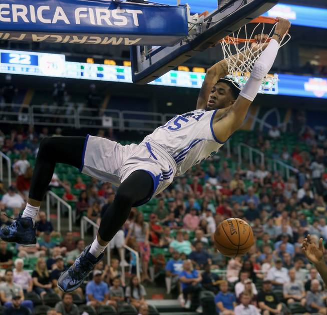 Philadelphia 76ers' Christian Wood dunks the ball during the first half of an NBA Summer League basketball game against the Boston Celtics, Monday, July 4, 2016, in Salt Lake City.