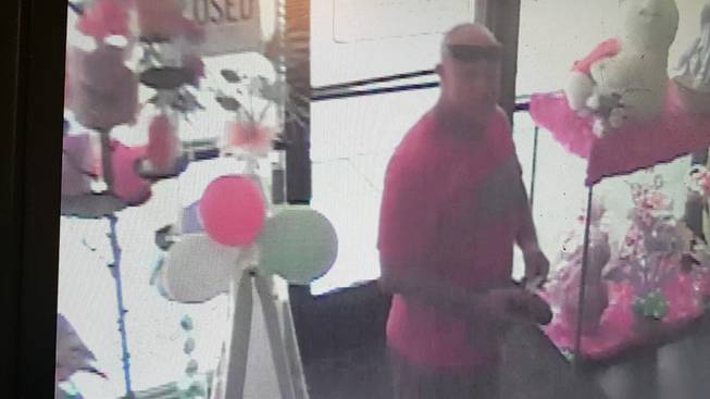 Metro Police are seeking this man, who entered a business near East Charleston Boulevard and Fremont Street in June, confronted an employee, and then used a weapon to steal the employee’s wallet and cellphone. The suspect is described as 35-40 years old, 5-foot-8, 180 pounds with a bald head.
