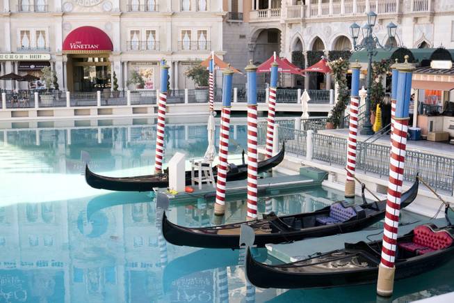 The gondolas at The Venetian Hotel & Casino, Thursday, July 7, 2016. The Venetian offers a "Gondola Rowing 101" class as part of the new Gondola University attraction.