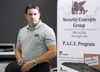 James Cameron, founder of Security Concepts Group, waits to be introduced before leading an active shooter training seminar at the Red Rock Search and Rescue training center Tuesday, July 12, 2016.