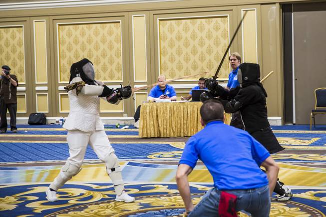 Sword-fighters compete in the women's long-sword competition during CombatCon 2016, at the Westgate Las Vegas Resort & Casino, Friday, July 8, 2016.