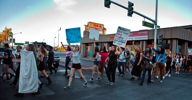 Supporters with the Black Lives Matter organization move along Stewart Avenue as they hold another protest and march in downtown Las Vegas on Saturday, July 16, 2016.