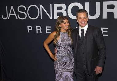 Luciana Barroso, left, and actor Matt Damon arrive for the Universal Pictures movie premiere of “Jason Bourne” at The Colosseum at Caesars Palace Monday, July 18, 2016.