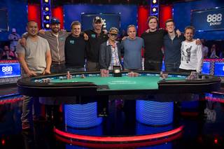 Members of the November Nine pose after the final table is determined for the World Series of Poker Main Event, just after midnight on Tuesday, July 19, 2016. Jerry Wong, Griffin Benger, Vojtech Ruzicka, Fernando Pons, Qui Nguyen, Cliff Josephy, Michael Ruane, Gordon Vayo and Kenny Hallaert.