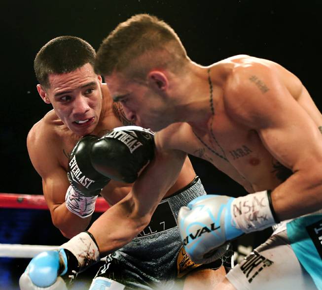 Oscar Valdez, left, connects with a blow on Matias Rueda during their featherweight fight at the MGM Grand Garden Arena on Saturday, July 23, 2016.