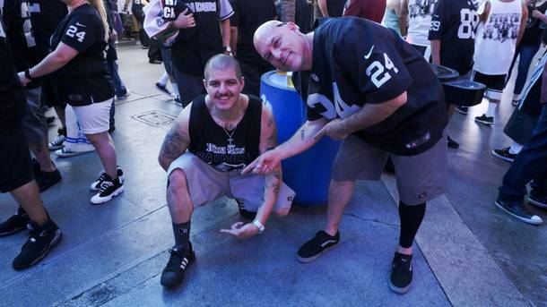 NFL Raiders fans were decked out in Raiders memorabilia for the Raider Nation hosted pub crawl in Downtown Las Vegas Friday, July 22, 2016.