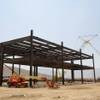The steel frame is seen under construction at the new Tesla Motors Inc., Gigafactory, Tuesday, July 26, 2016, in Sparks, Nev. It's Tesla Motors biggest bet yet: a massive, $5 billion factory in the Nevada desert that could almost double the world's production of lithium-ion batteries by 2018. (AP Photo/Rich Pedroncelli)