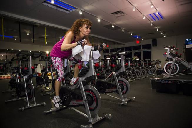 Dr. Souzan El-Eid, a surgeon with the Comprehensive Cancer Centers Of Nevada, workouts on a stationary bike Monday, June 20, 2016.