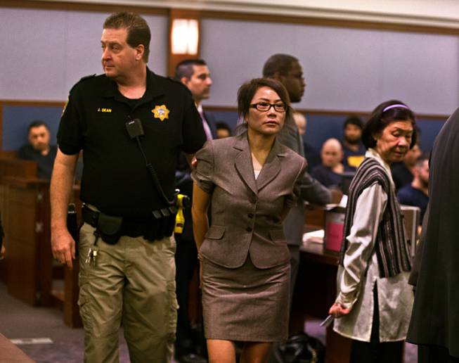 Zimei Patton, who prosecutors said ran a massage parlor that essentially operated as a brothel is taken into custody facing one count each of pandering, living from the earnings of a prostitute and bribery in Justice Court on Wednesday, July 27, 2016. She is connected to Michael Bass, a former Henderson city employee has been indicted in connection with tipping off massage parlors to possible raids in exchange for sexual favors.  L.E. Baskow