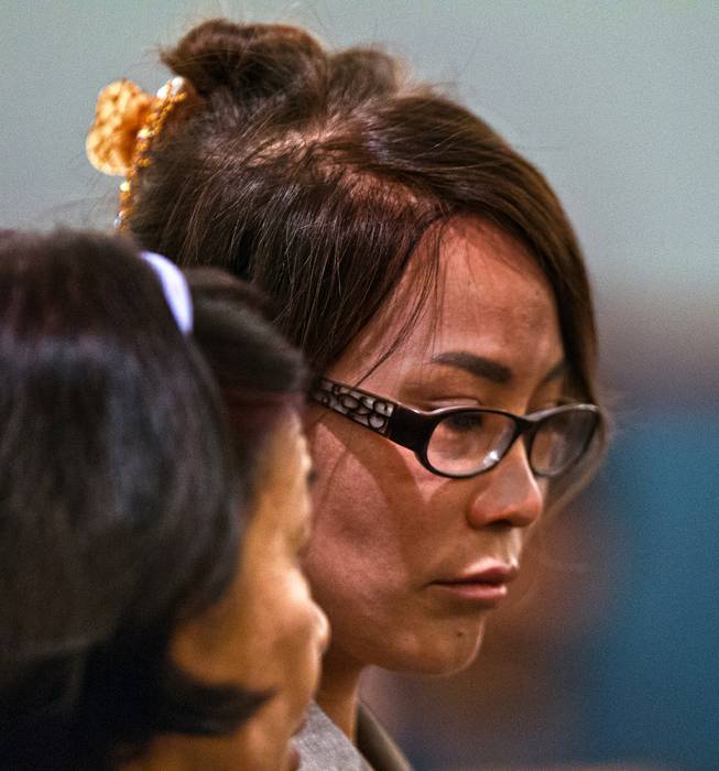 Zimei Patton, who prosecutors said ran a massage parlor that essentially operated as a brothel is taken into custody facing one count each of pandering, living from the earnings of a prostitute and bribery in Justice Court on Wednesday, July 27, 2016. She is connected to Michael Bass, a former Henderson city employee has been indicted in connection with tipping off massage parlors to possible raids in exchange for sexual favors.  L.E. Baskow