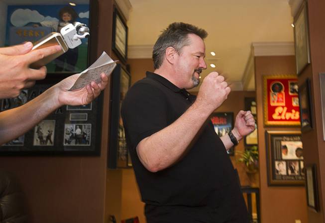 Entertainer Terry Fator pumps his fists after recording some dialogue before a performance in the Terry Fator Theatre in the Mirage Wednesday, July 27, 2016. The audio will be used for a video in a later show.