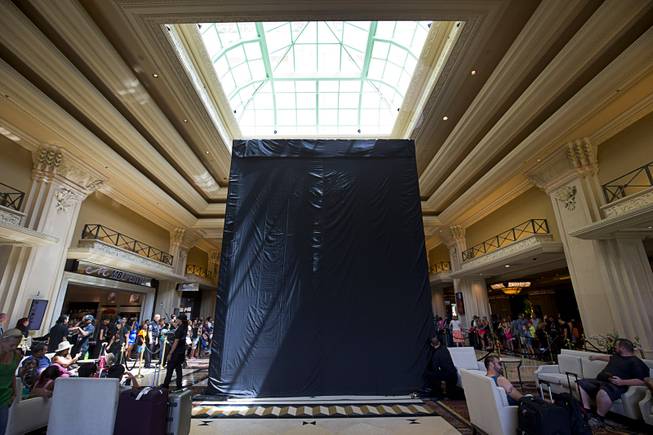 Drapes cover a Michael Jackson statue before an unveiling ceremony in the Mandalay Bay lobby Thursday, July 28, 2016. The 10-foot-tall statue is on loan from the Estate of Michael Jackson.