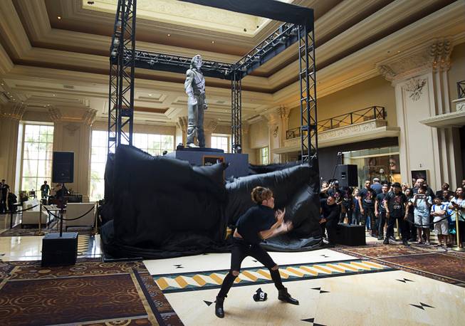 A 10-foot-tall Michael Jackson statue is unveiled in the Mandalay Bay lobby Thursday, July 28, 2016. The statue is on loan from the Estate of Michael Jackson.