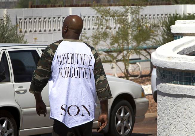 Mario Richey, father of Morland Antwon Richey-Elder, wears a shirt created in honor of his slain son Thursday, July 28, 2016. Elder was 20-years-old when he was shot and killed at a house party on July 28, 2014. The case is still unsolved.