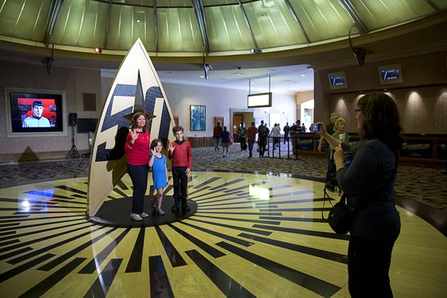 Daphne Shafer of California, Md. and her children Lydia, 7, and Ryan 11, pose in the Rio Pavilion lobby during the final day of Creation Entertainment's annual Official Star Trek convention at the Rio Sunday, August 7, 2016. This year marked the 50th anniversary of the original series.