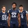 Members of the Shadow Ridge High football team pose for a photo at the Las Vegas Sun's high school football media day July 20, 2016 at the South Point. They include, from left, Trevor Sablan, Aubrey Nellems, and Kaejin Smith-Bejgrowicz.