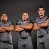 Members of the Palo Verde High football team pose for a photo at the Las Vegas Sun's high school football media day July 20, 2016 at the South Point. They include, from left, Stephen Garcia, Maxie Miller-Hooks, and Tyler Thornton.
