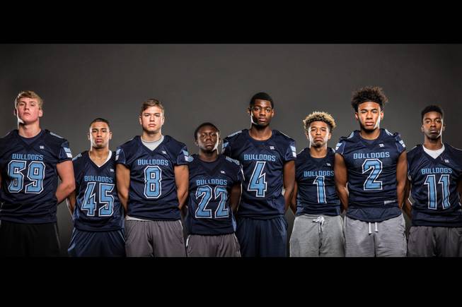 Members of the Centennial High football team pose for a photo at the Las Vegas Sun's high school football media day July 20, 2016 at the South Point. They include, from left, Jacob Kelly, Marvin Perkins Jr., Jacob Arsen, Kayuon Miller, J.J. Johnson, Bryce Hamton, Jamaal Evans, and Savon Scarver.