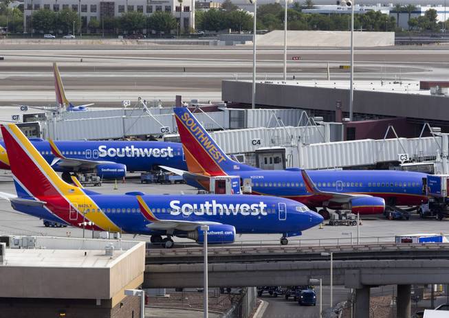 Southwest Airlines passenger jets are shown at McCarran International Airport Tuesday, August 2, 2016.